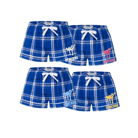 Blue plaid shorts featuring synchro skating design.