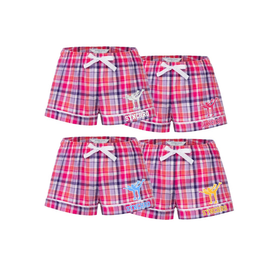 Pink Plaid shorts with synchro skating designs.