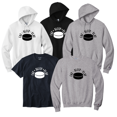 Collection of hoodies and t-shirts with a hockey puck and text design on a white background.