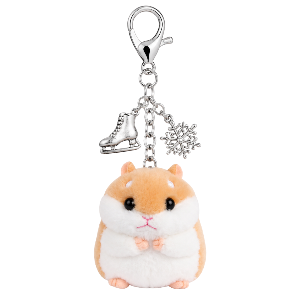 A plush hamster keychain charm with a silver-tone lobster clasp, featuring a small white and brown hamster with a silver ice skate and snowflake charm on a white background.
